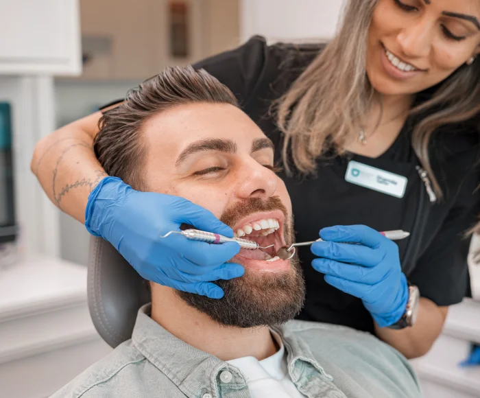 Patient receiving dental treatment in modern Bradford dental office