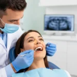 Dentist examining a patient’s tooth for possible decay and a dental filling.